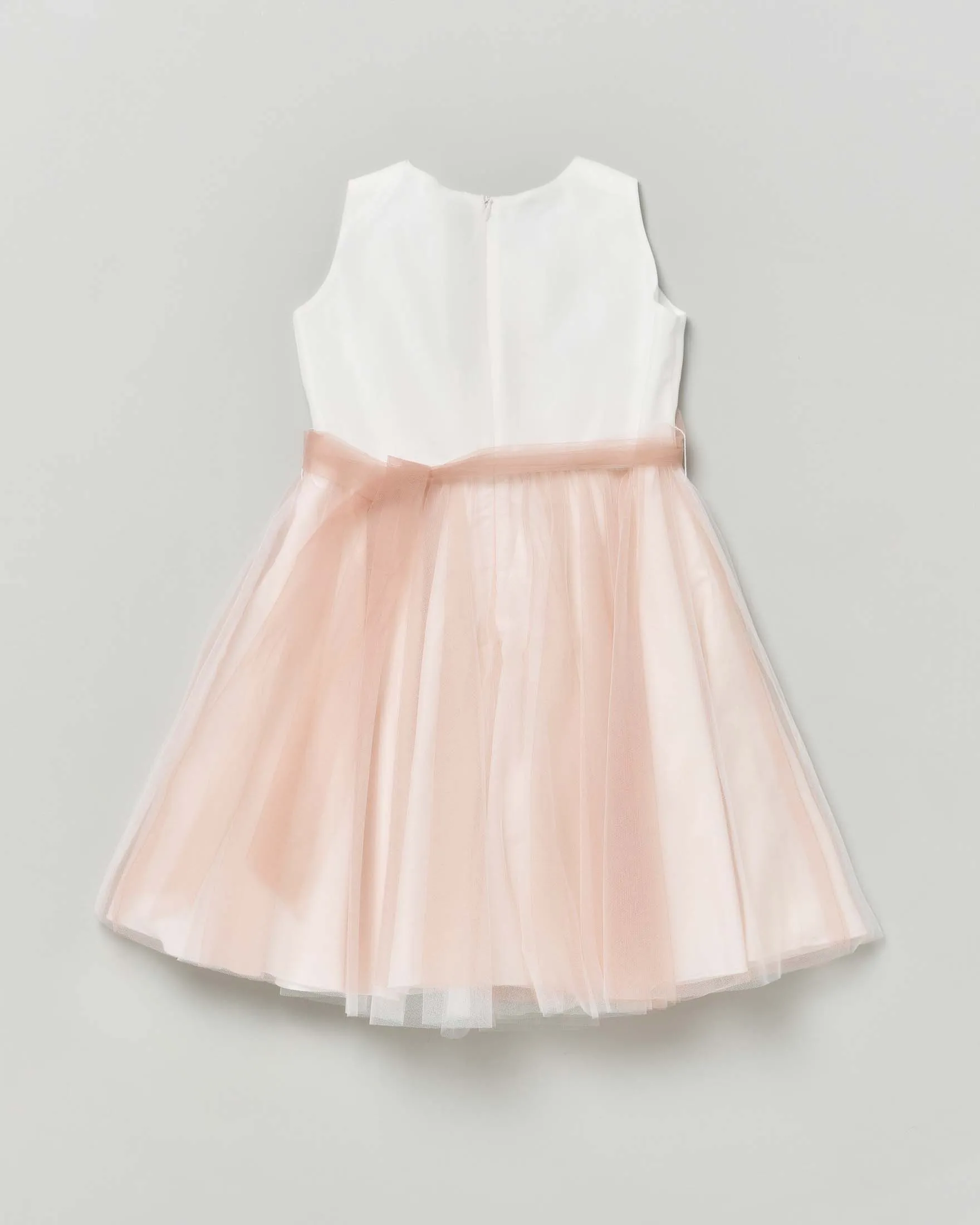 Abito mini bianco senza maniche con tulle cipria e fusciacca in organza cipria con fiore 8 anni