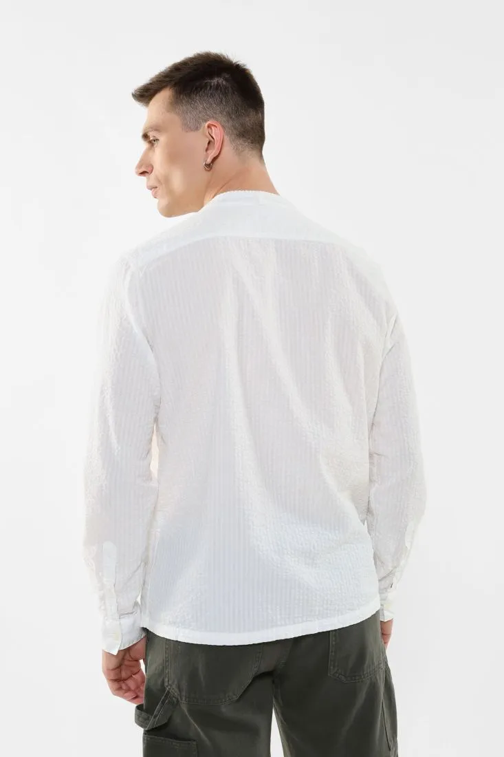 Camicia rigata in puro cotone con scollo a V
