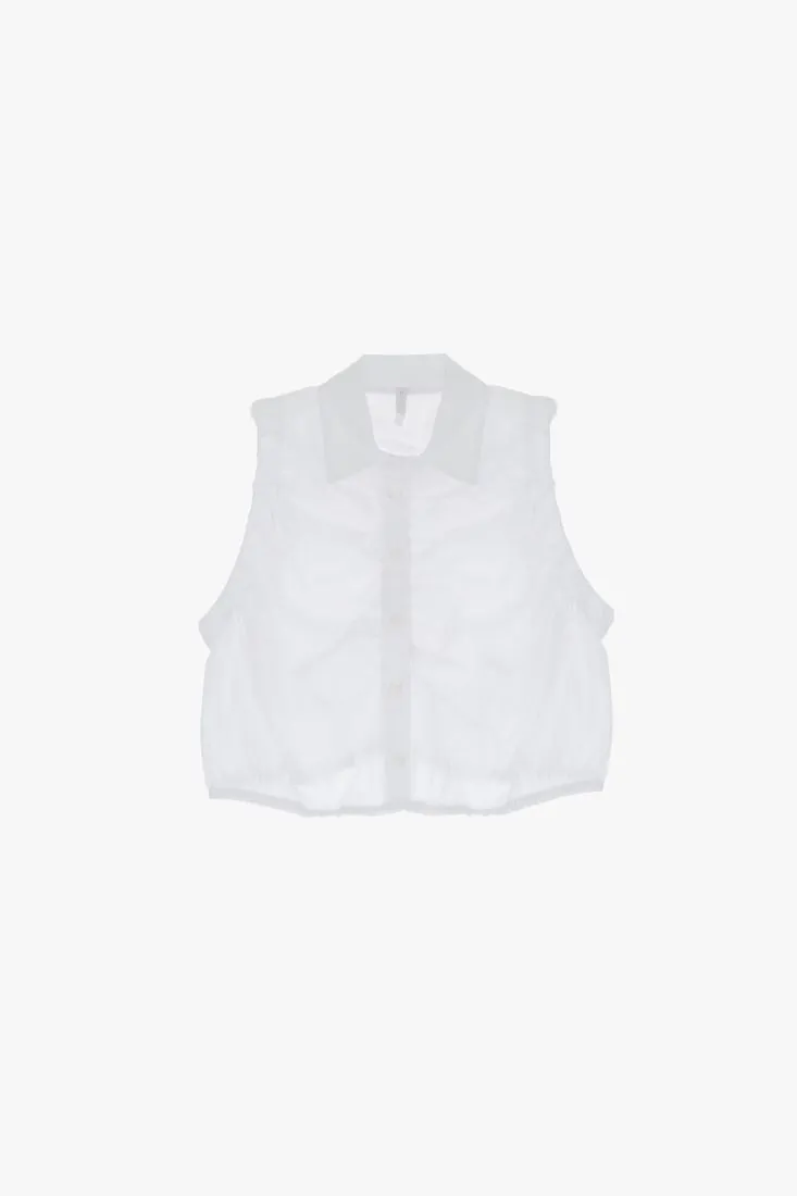 Camicia smanicata cropped monocolour con colletto classico