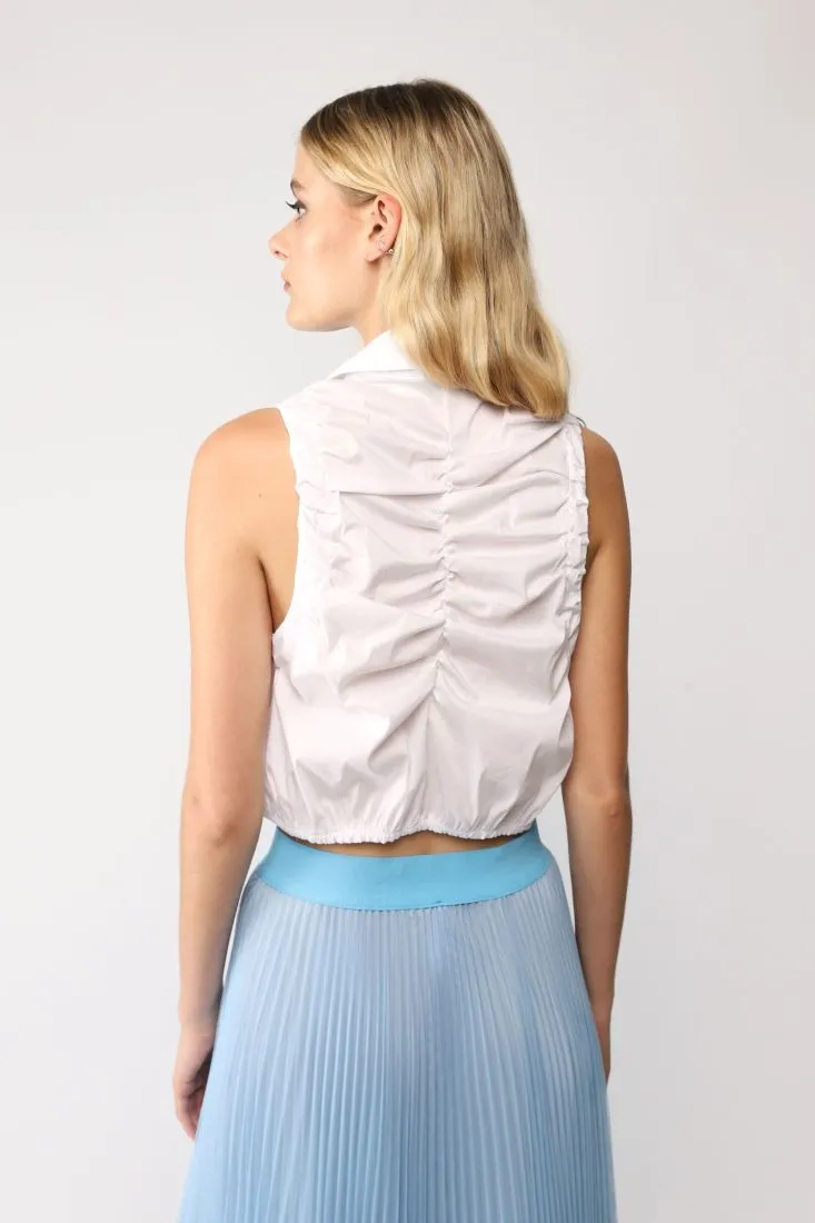Camicia smanicata cropped monocolour con colletto classico