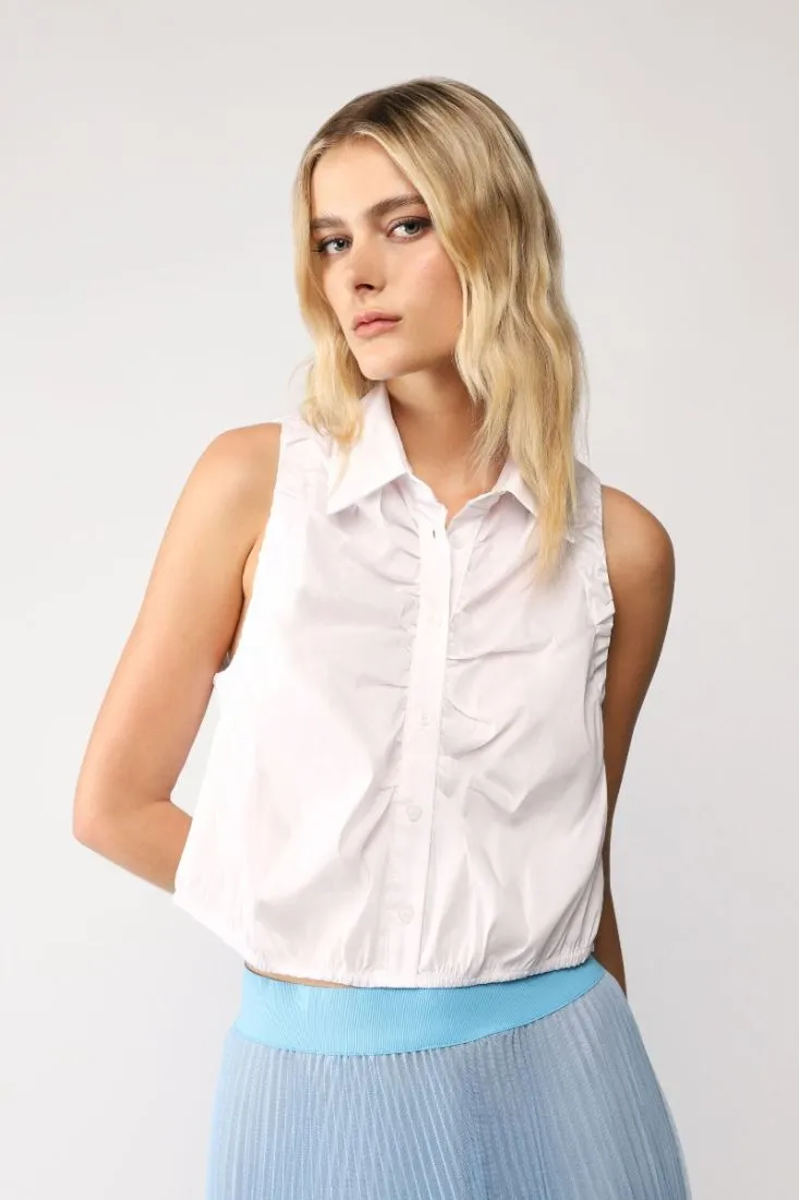 Camicia smanicata cropped monocolour con colletto classico