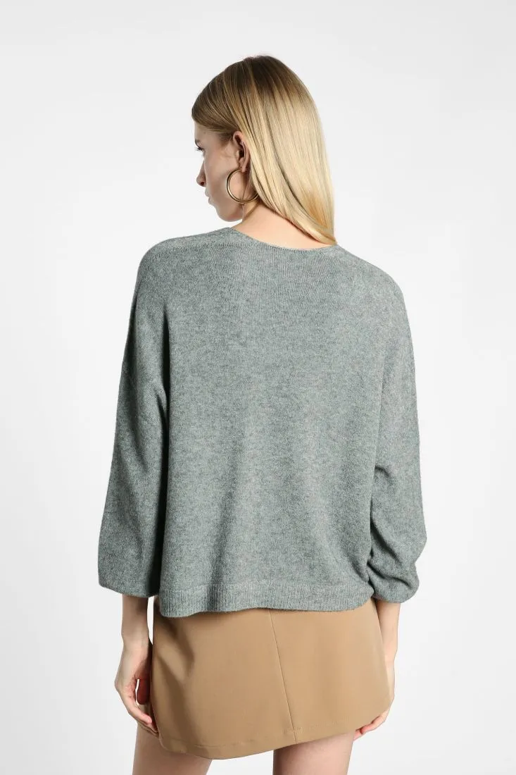 Cardigan oversize monocolour con abbottonatura e tasche applicate