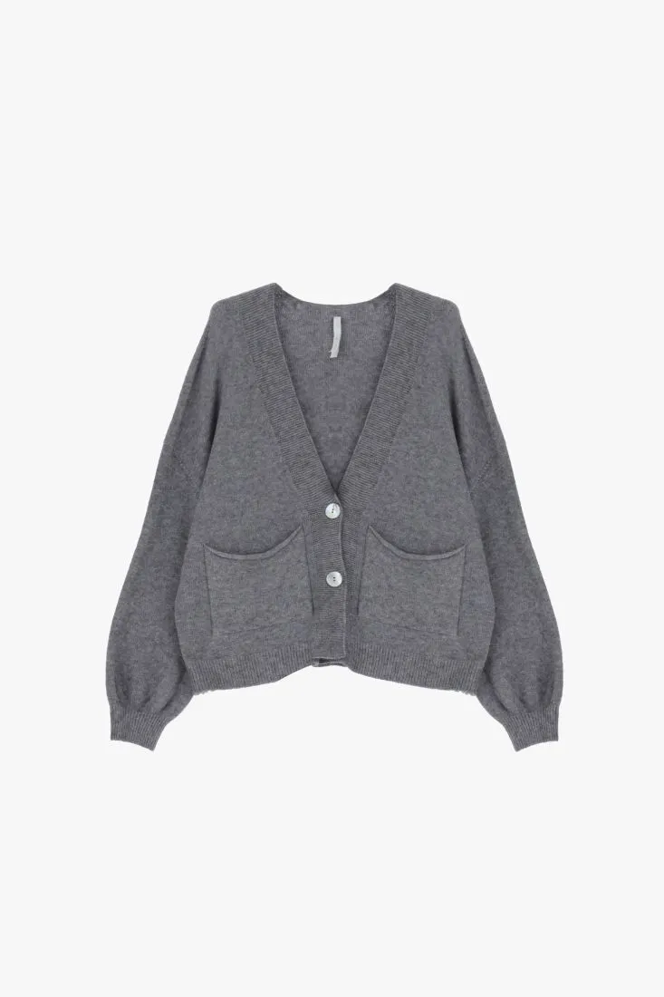 Cardigan oversize monocolour con abbottonatura e tasche applicate