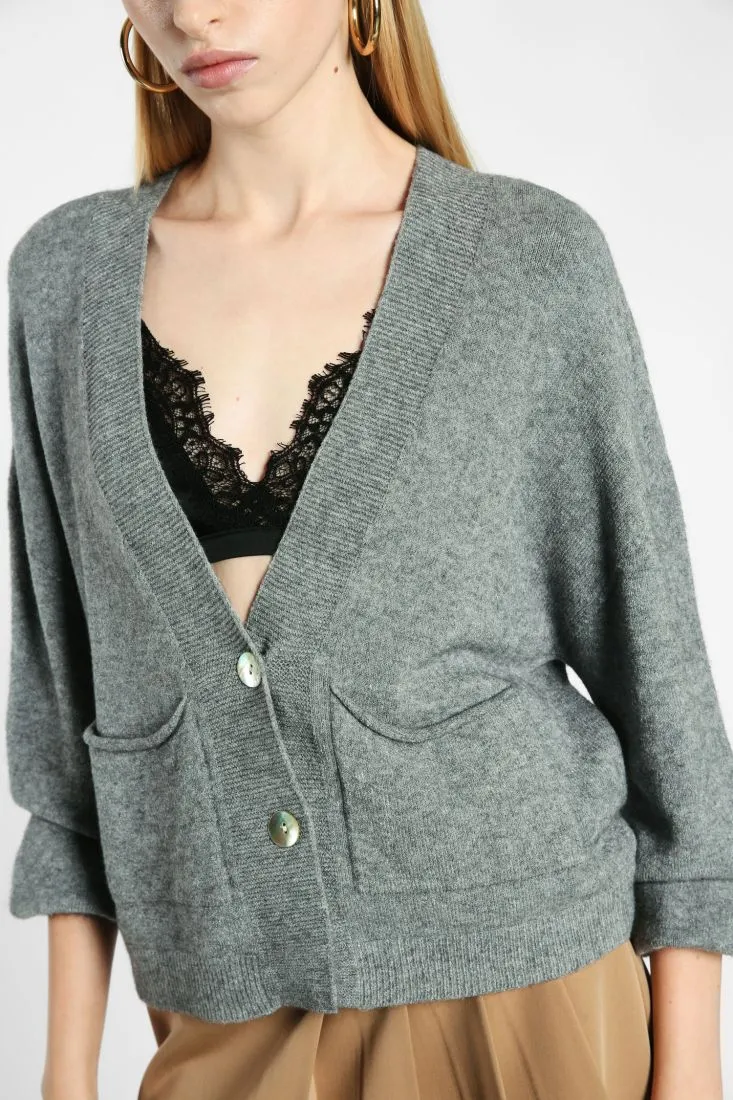 Cardigan oversize monocolour con abbottonatura e tasche applicate