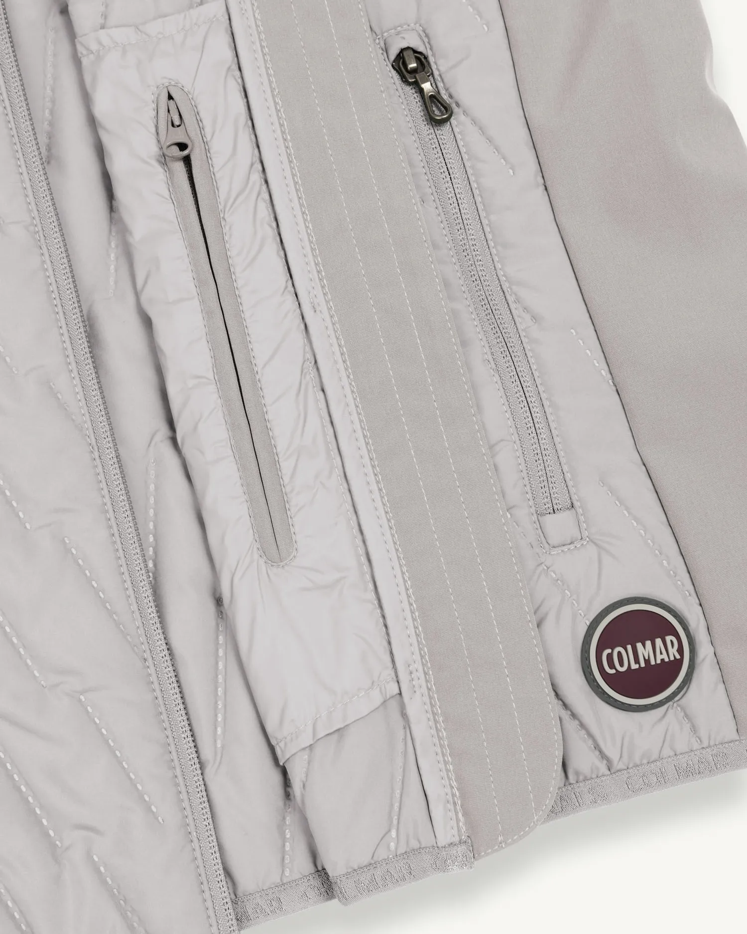 Gilet color ghiaccio con inserti in softshell