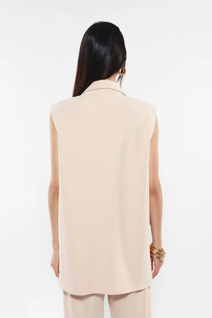 Gilet lungo doppiopetto monocolour con rever a lancia
