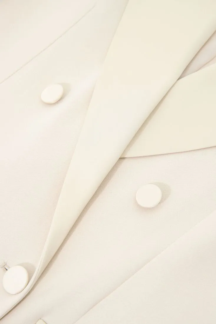 Gilet lungo doppiopetto monocolour con rever a lancia