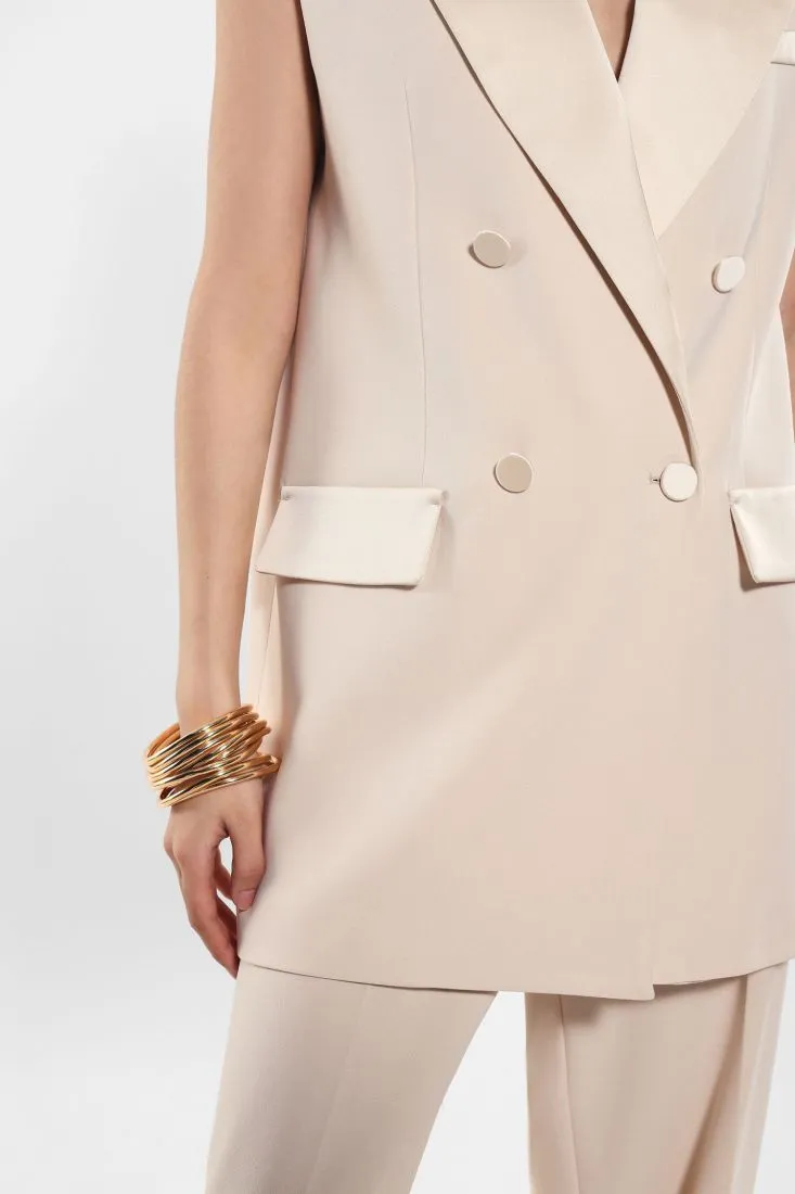Gilet lungo doppiopetto monocolour con rever a lancia