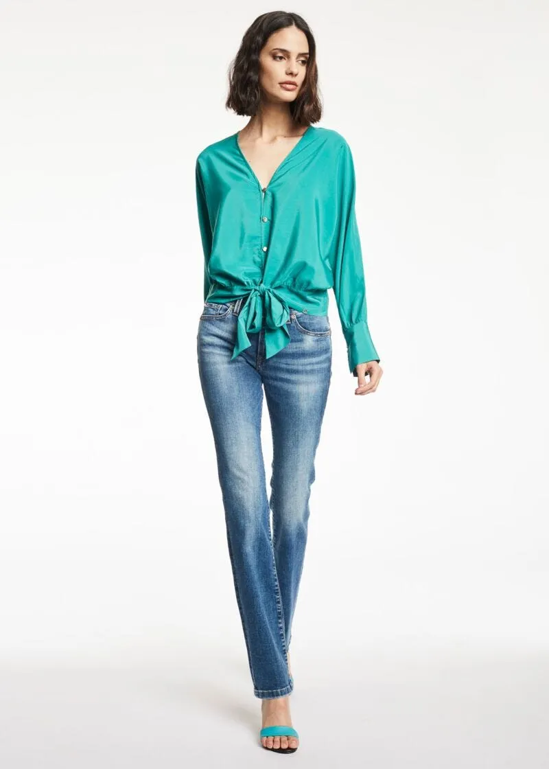 Jeans con tasche logate