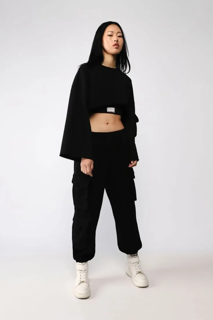 Pantaloni cargo monocolour con tasche laterali applicate