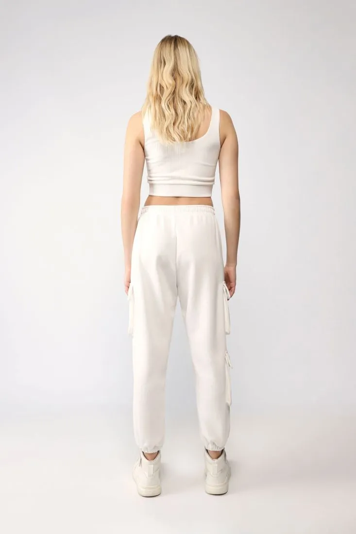 Pantaloni cargo monocolour con tasche laterali applicate