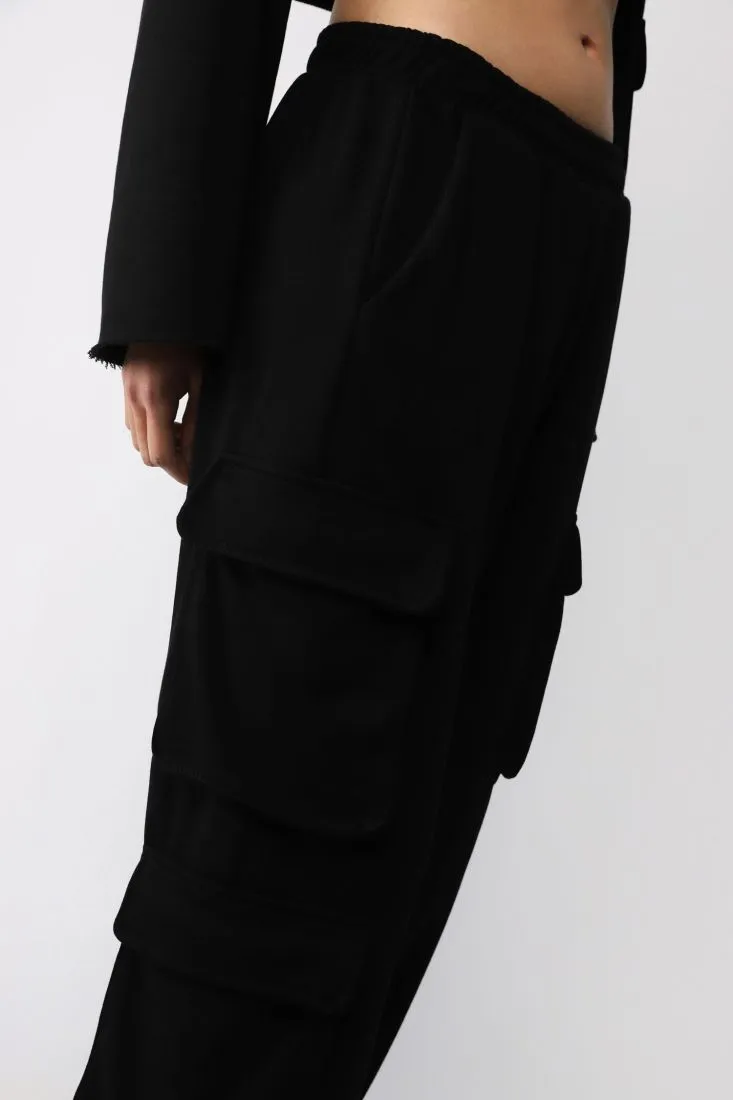 Pantaloni cargo monocolour con tasche laterali applicate