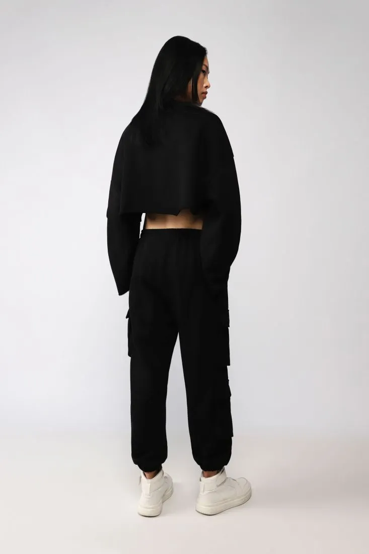 Pantaloni cargo monocolour con tasche laterali applicate