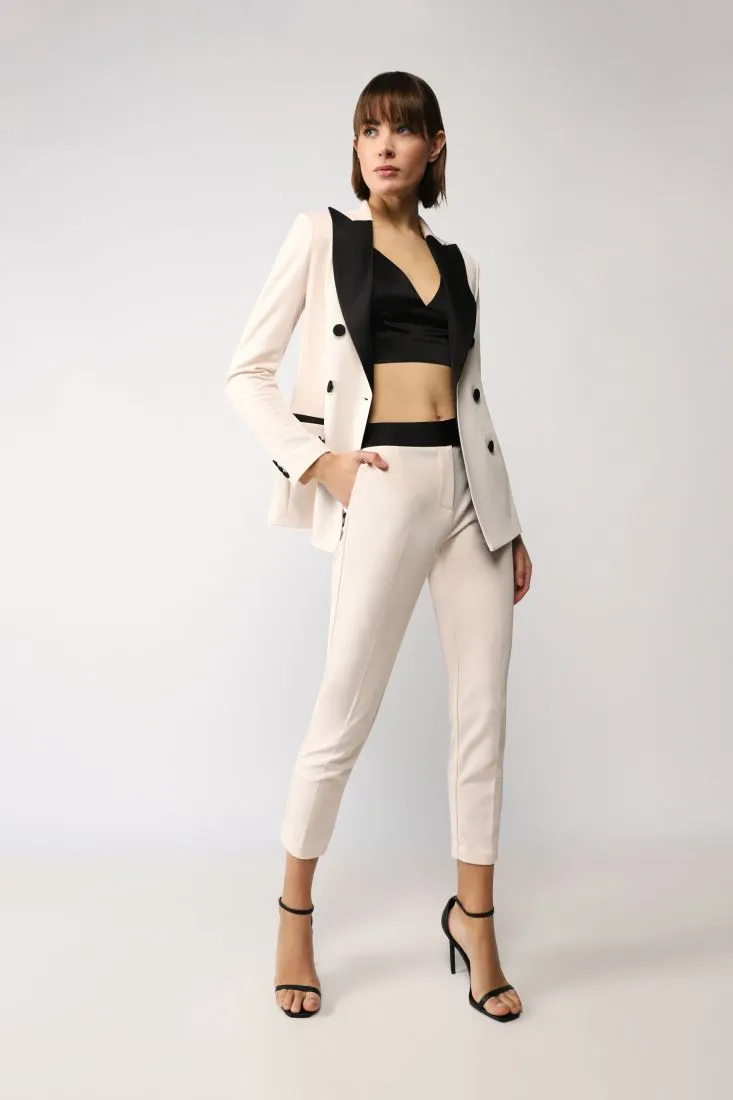 Pantaloni cropped slim-fit con fascia in vita a contrasto