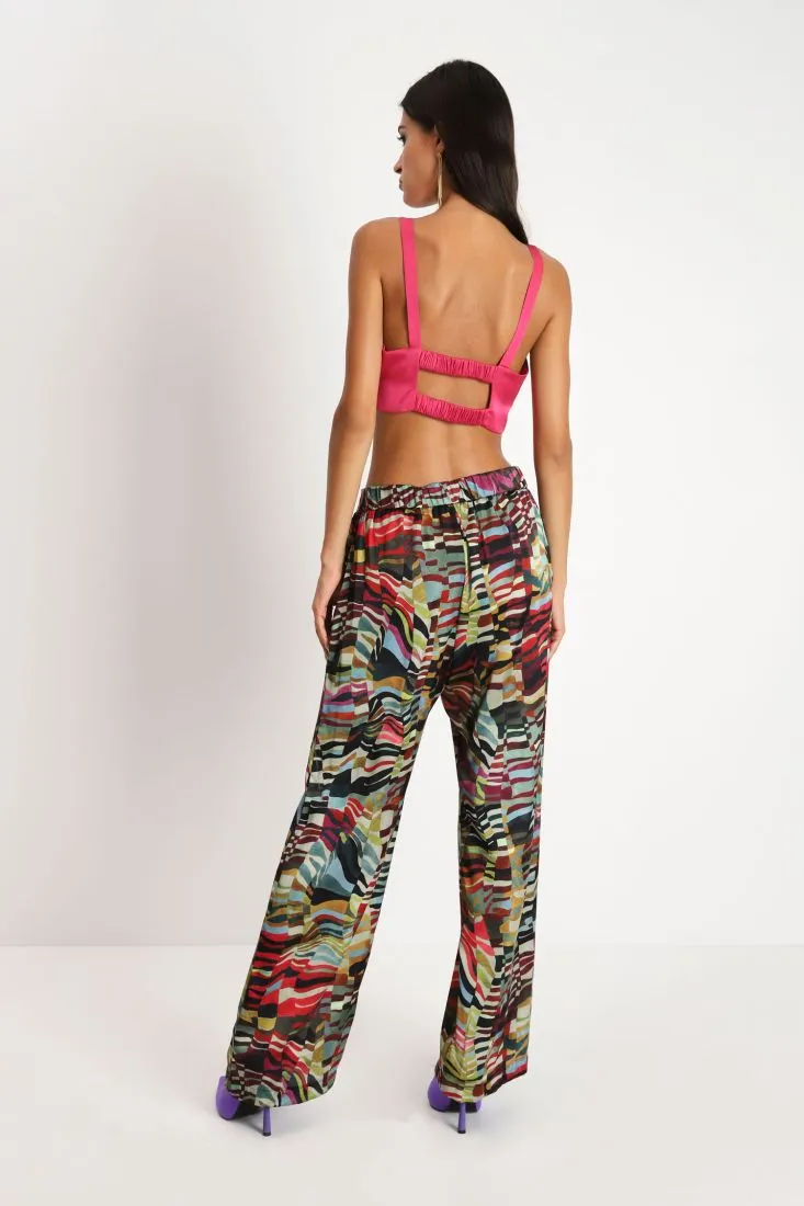 Pantaloni flare con fantasia optical multicolor