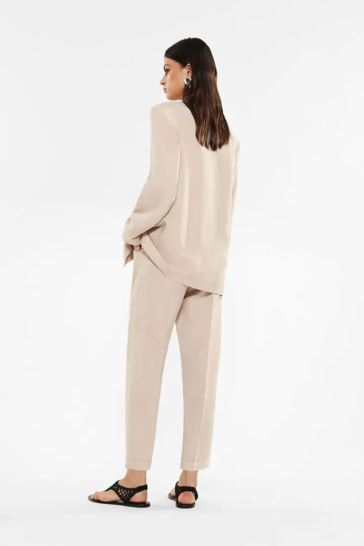 Pantaloni slim-fit cropped con piega stirata