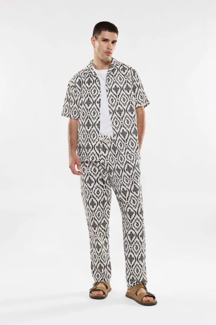 Pantaloni slim-fit fantasia astratta con coulisse e pinces