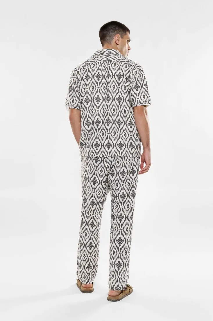 Pantaloni slim-fit fantasia astratta con coulisse e pinces
