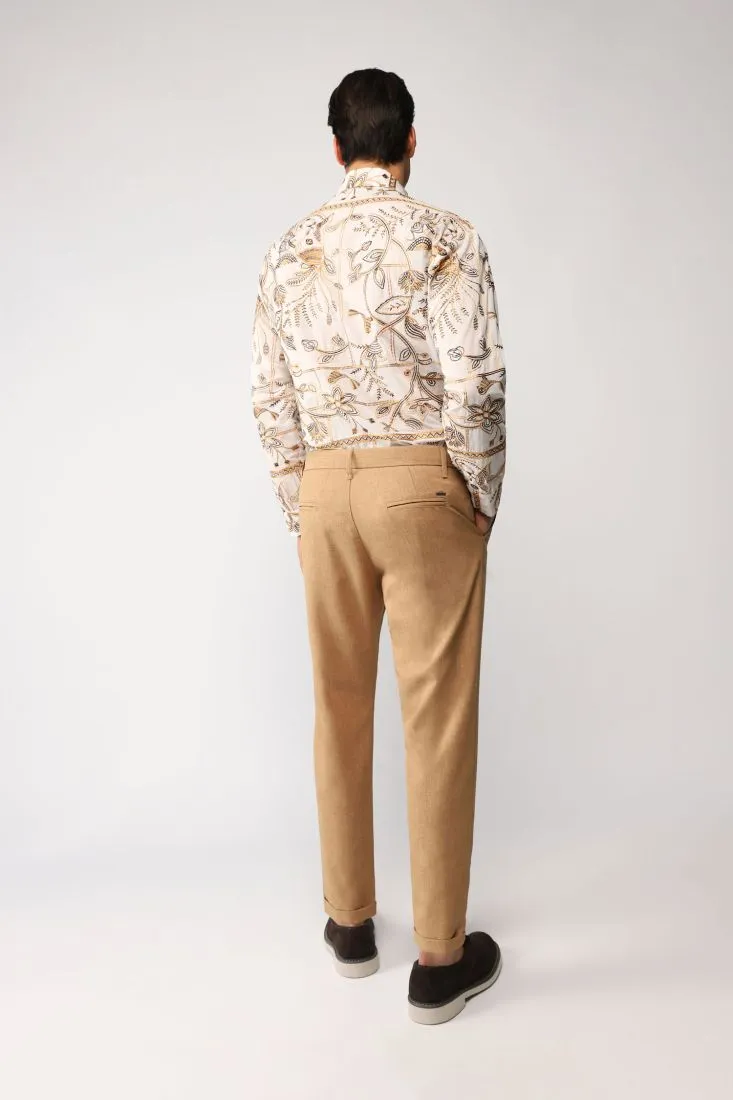 Pantaloni straight monocolour con orli risvoltati