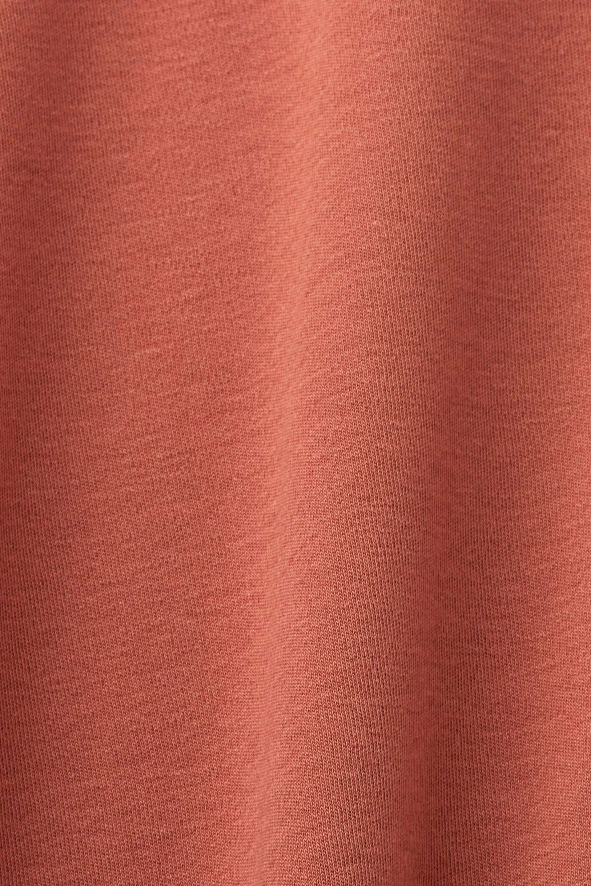 T-shirt oversize con tasca applicata