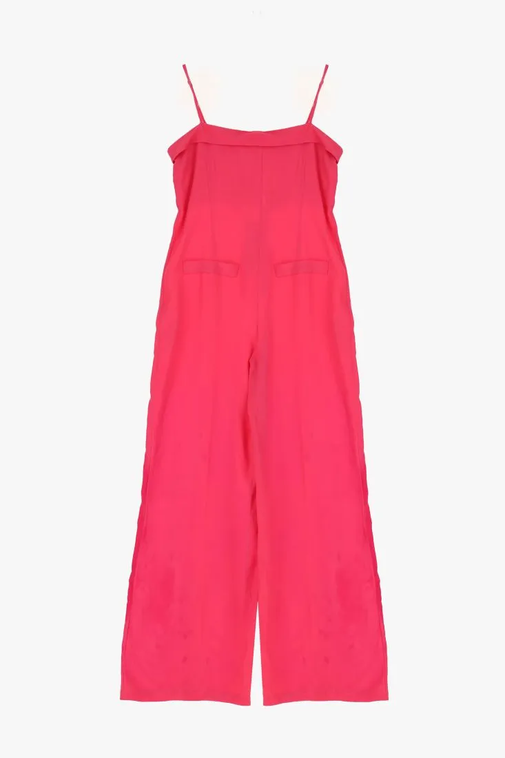 Tuta monocolour con tasche a filetto e pantaloni a palazzo